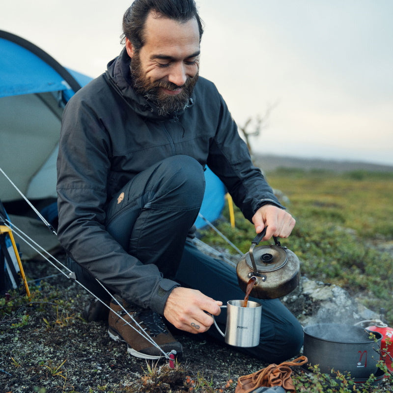 A man camping in Fjallraven Abisko gear, for the Fjallraven Buyer's Guide