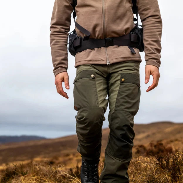 A man walking in some Fjallraven Keb Trousers